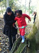 Nursery manager Caroline Walker visits woodland with Hope Nursery children